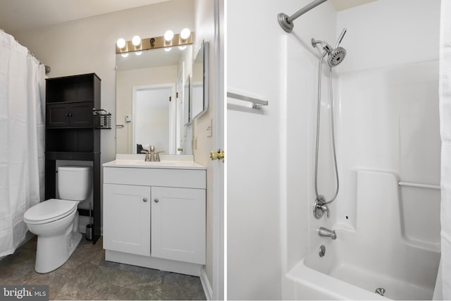 bathroom with toilet and vanity