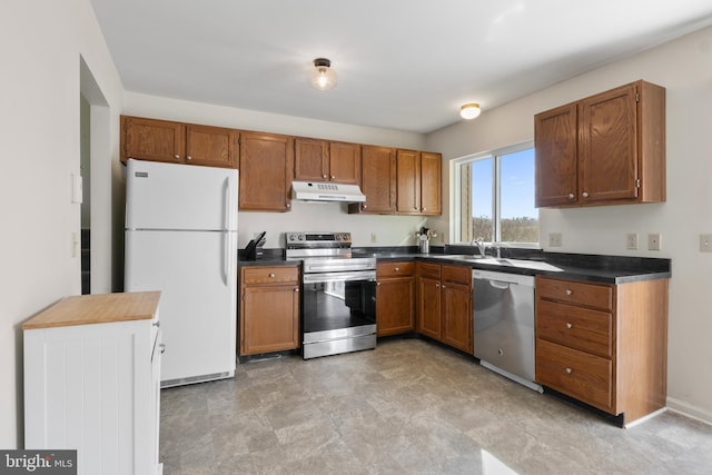 kitchen featuring stainless steel appliances and sink