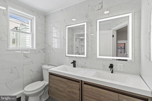 bathroom featuring crown molding, tile walls, vanity, a shower, and toilet