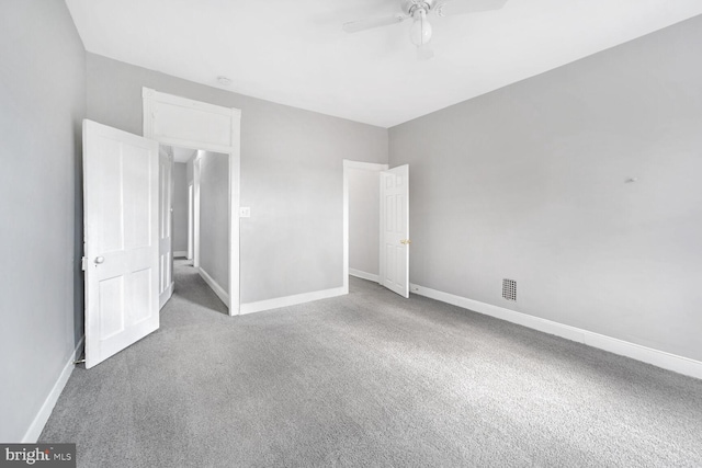 unfurnished bedroom with ceiling fan and carpet floors