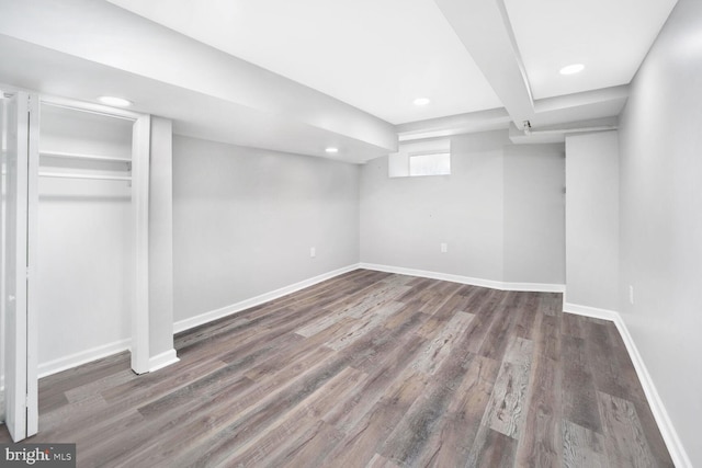 basement with dark wood-type flooring