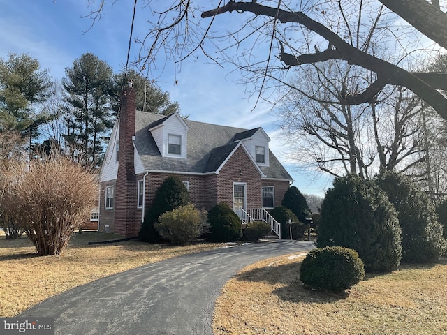 view of cape cod-style house