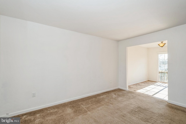 empty room with light carpet