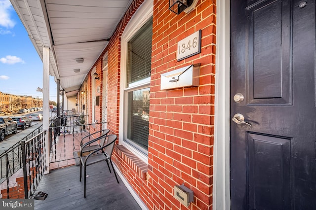 balcony featuring a porch