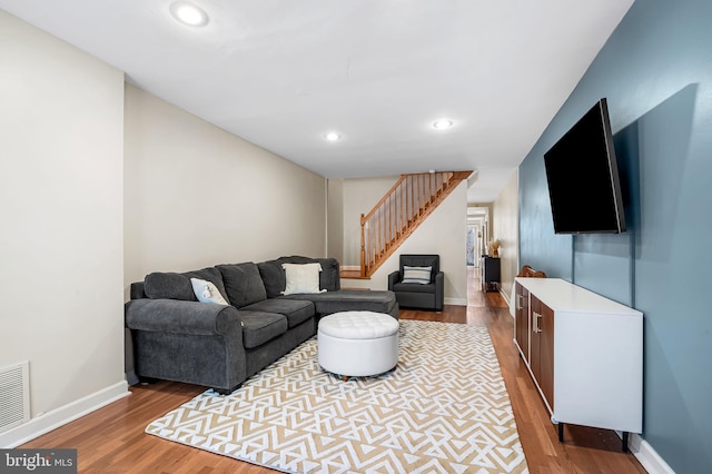 living room with wood-type flooring