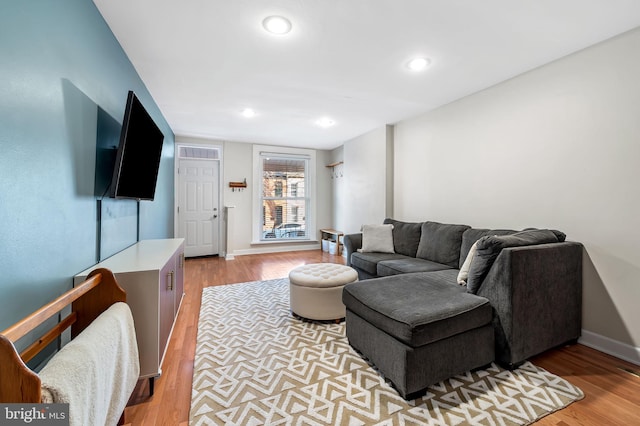 living room featuring light wood-type flooring