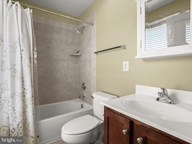 full bathroom with vanity, toilet, and shower / bath combo with shower curtain