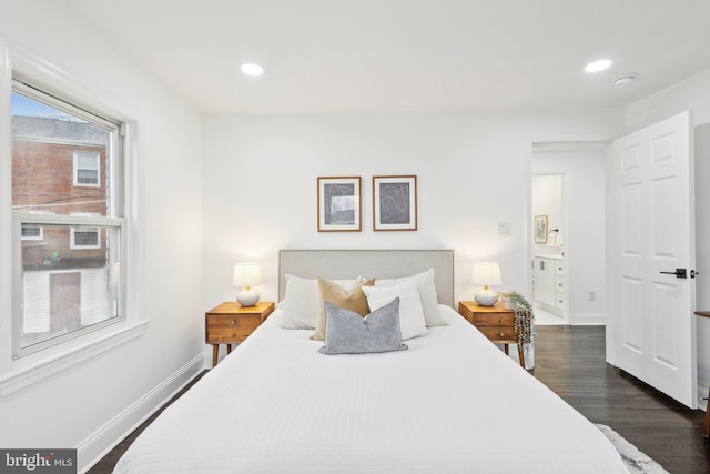 bedroom with dark wood-type flooring, recessed lighting, and baseboards