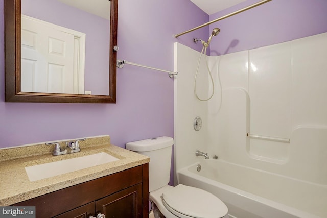 full bathroom with shower / tub combination, vanity, and toilet