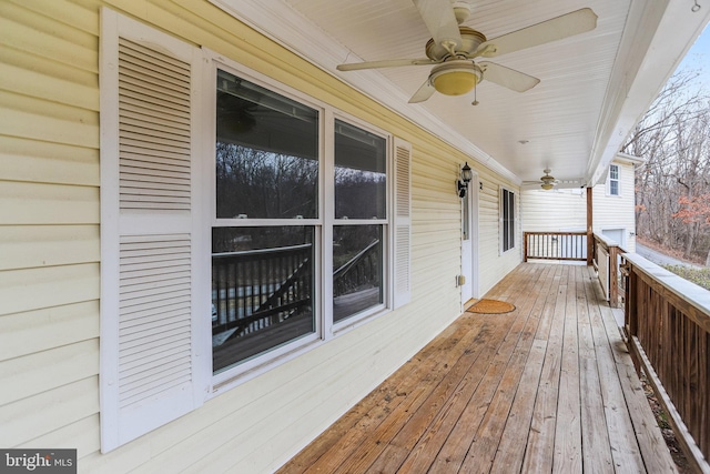 wooden terrace with ceiling fan