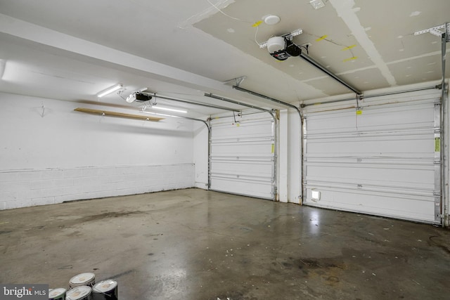 garage featuring a garage door opener