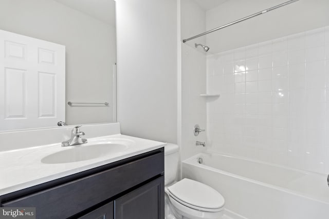 full bathroom featuring vanity, tub / shower combination, and toilet