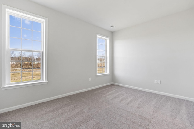 view of carpeted spare room