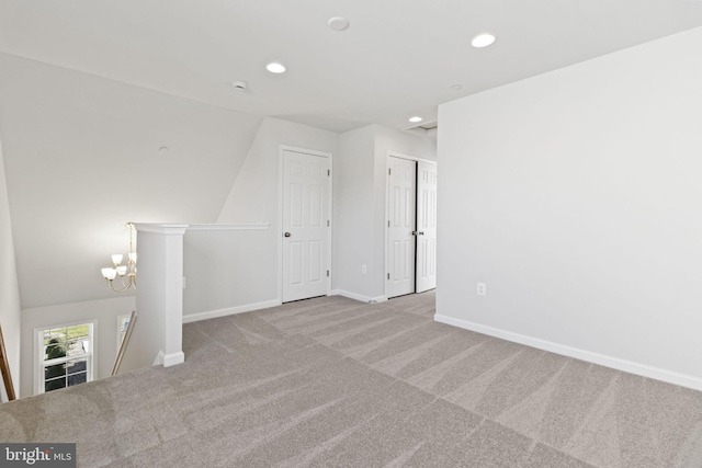 additional living space with light colored carpet