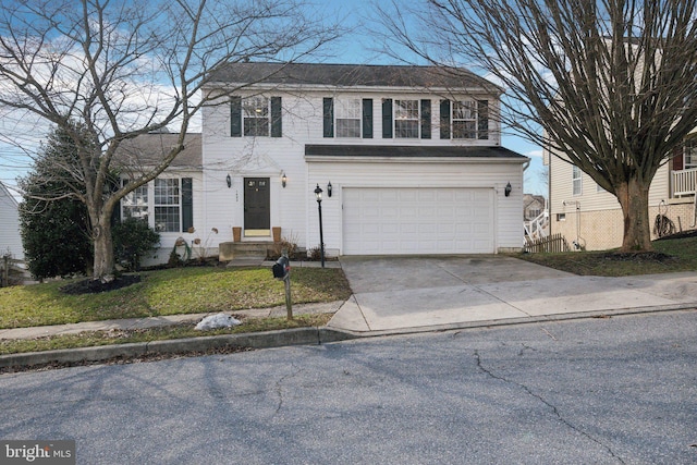 view of front of home featuring a garage and a front lawn