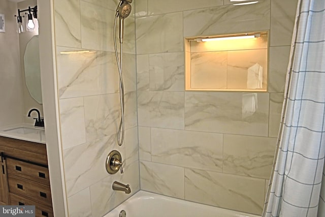 bathroom with shower / bathtub combination with curtain and vanity