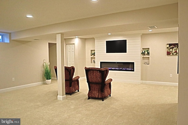 living area with light carpet