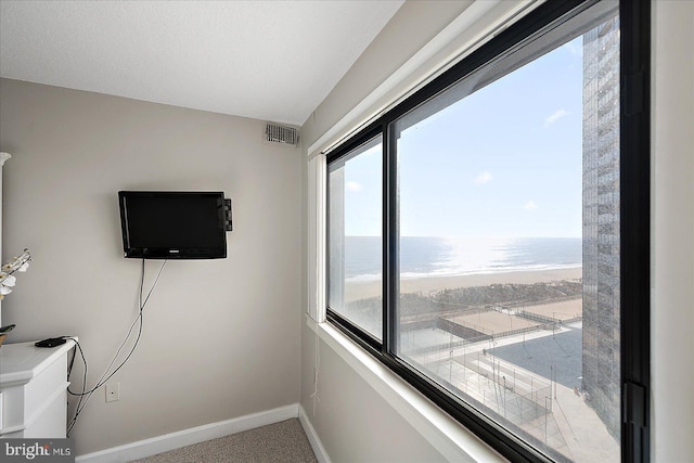 interior space with a textured ceiling