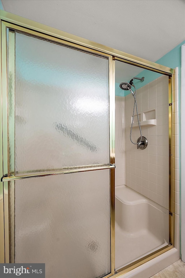 bathroom featuring walk in shower