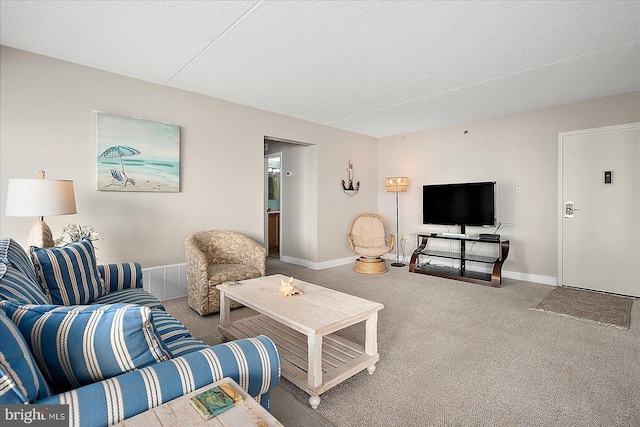 carpeted living room with a textured ceiling