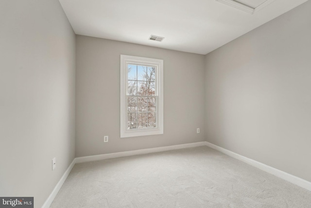 view of carpeted spare room