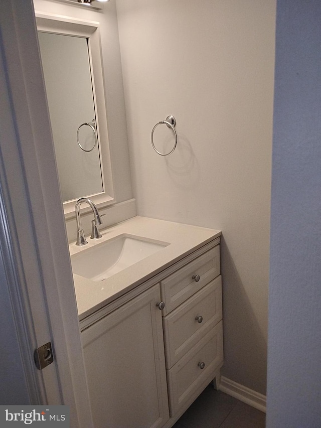 bathroom with vanity and tile patterned floors