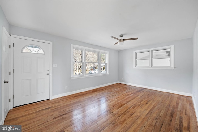 entrance foyer featuring ceiling fan and light wood-type flooring