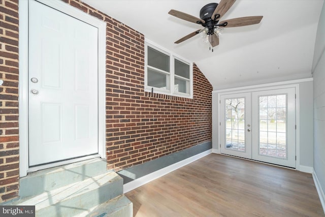 interior space featuring french doors and ceiling fan