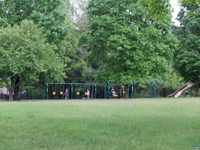 view of community featuring a yard and a playground