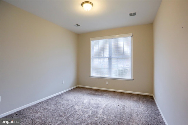 view of carpeted spare room