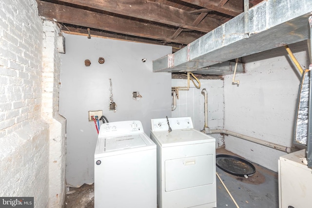 laundry room with washer and dryer