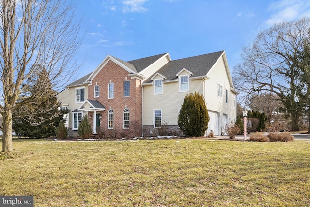 view of front facade featuring a garage and a front lawn