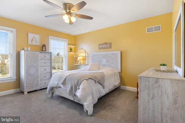 bedroom featuring ceiling fan and carpet floors