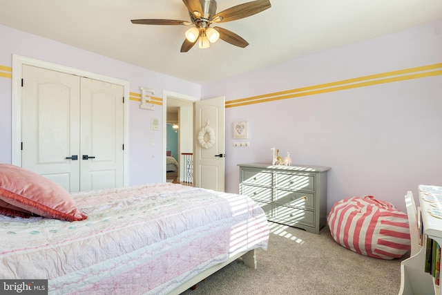 carpeted bedroom with ceiling fan