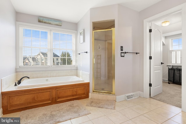 bathroom featuring shower with separate bathtub and tile patterned floors