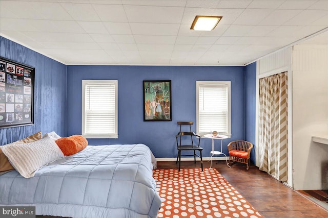 bedroom with hardwood / wood-style floors