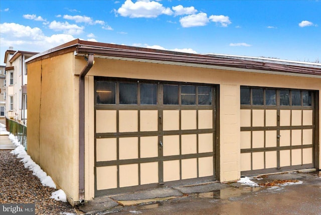 view of snow covered garage