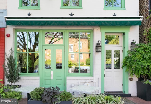 property entrance featuring french doors