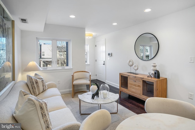 living room with light hardwood / wood-style floors