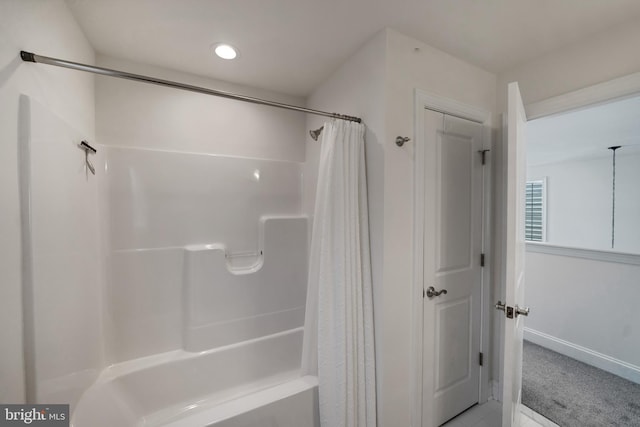 bathroom featuring shower / bath combination with curtain