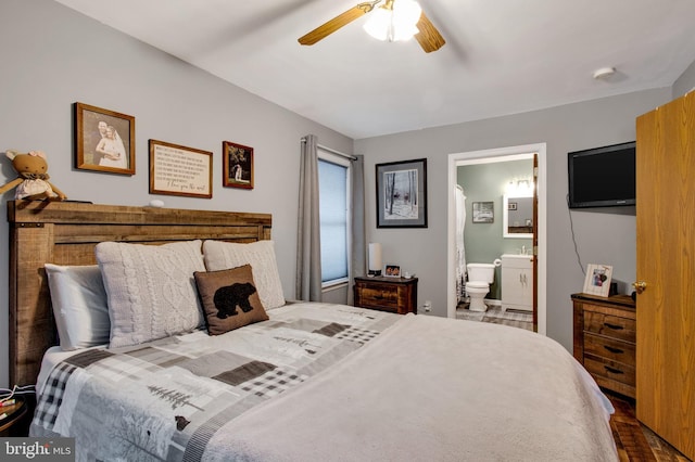 bedroom with connected bathroom and ceiling fan