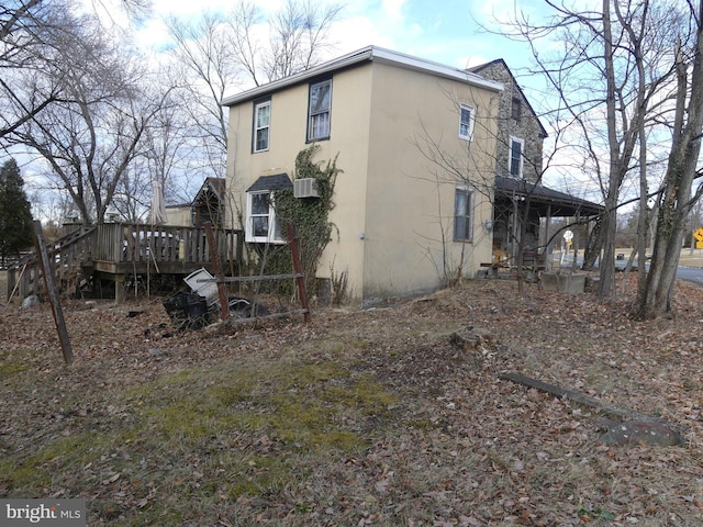 exterior space featuring a wooden deck