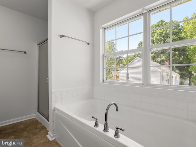 226 Shannonbrook Ln, Frederick, MD 21702 - bathroom with healthy amount of natural light, a bath, and an enclosed shower