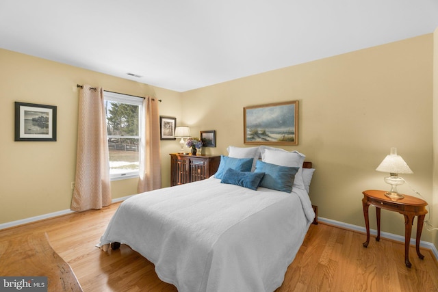 bedroom featuring light hardwood / wood-style flooring