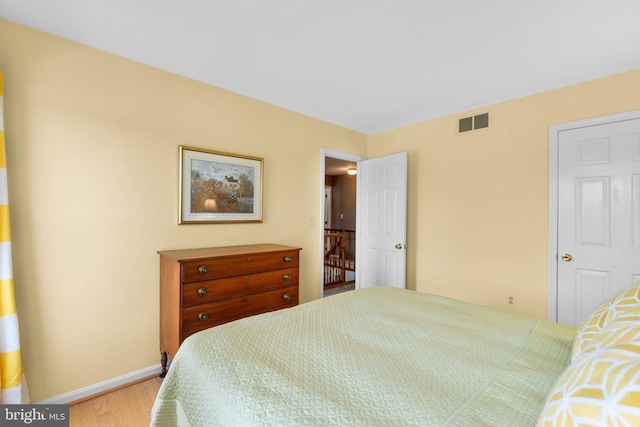 bedroom with light hardwood / wood-style flooring