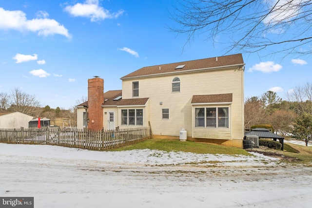 view of snow covered property