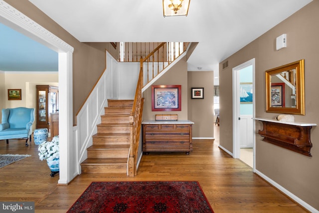 stairway with wood-type flooring