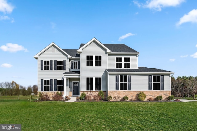 view of front of home featuring a front lawn