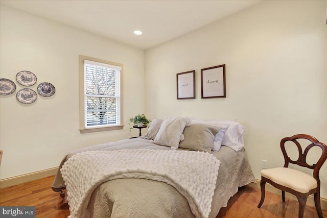 bedroom featuring hardwood / wood-style flooring