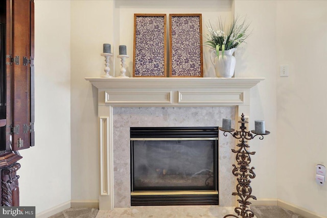 room details featuring a premium fireplace